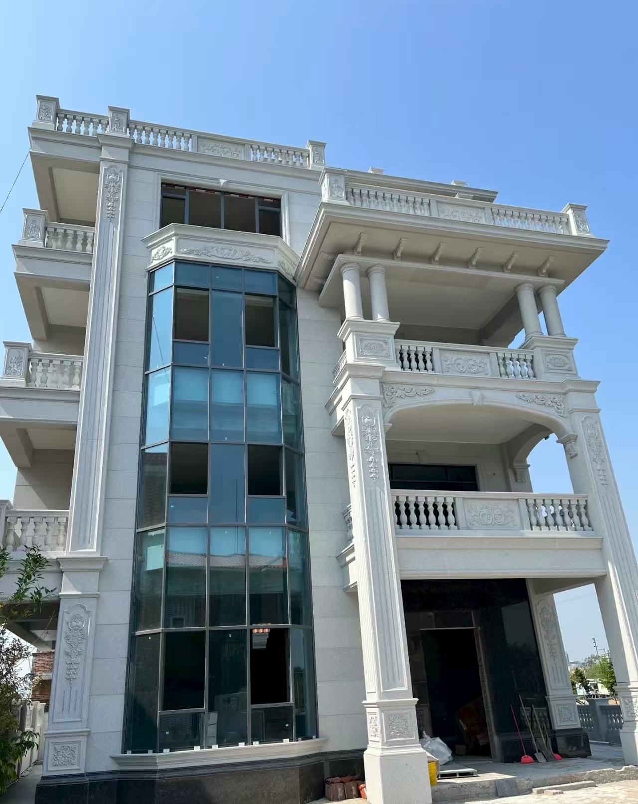 巴彦淖尔 白麻花岗岩别墅外墙干挂效果展示