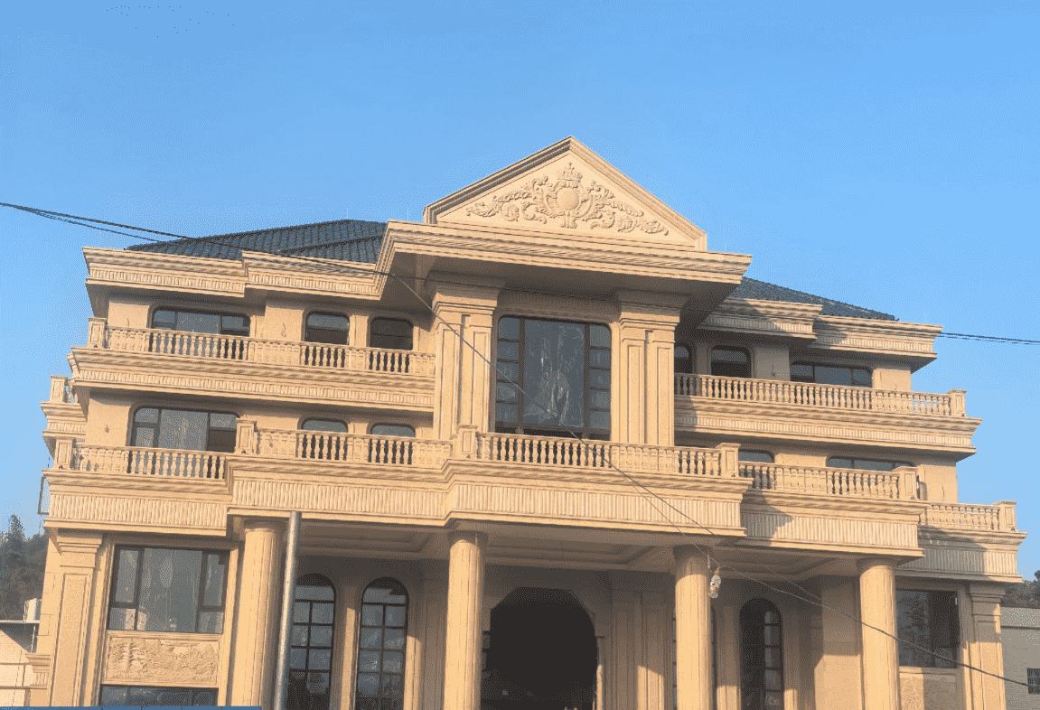 巴彦淖尔黄金麻别墅外墙干挂石材效果示例