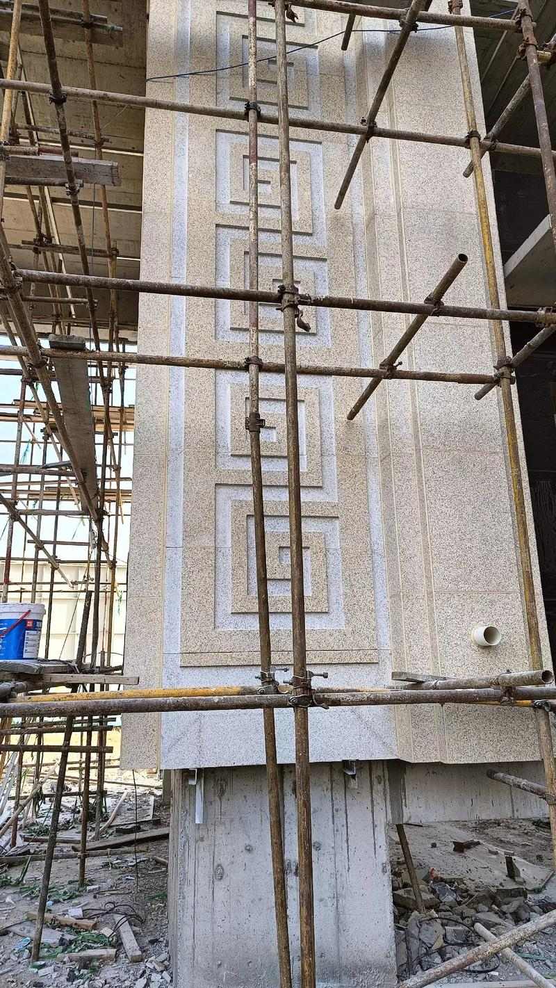 巴彦淖尔 黄金麻花岗岩别墅外墙干挂回纹造型效果